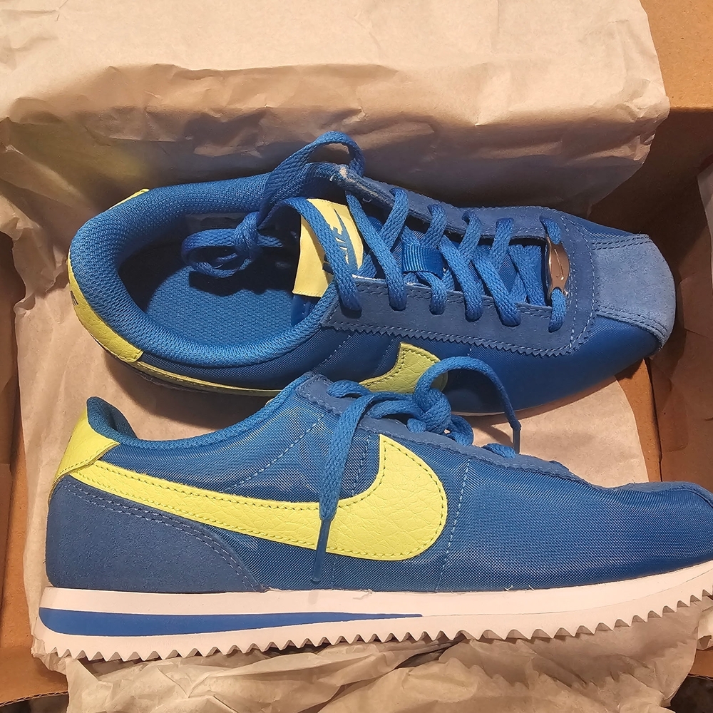 Nike Kids Blue Sneakers with Yellow Swoosh